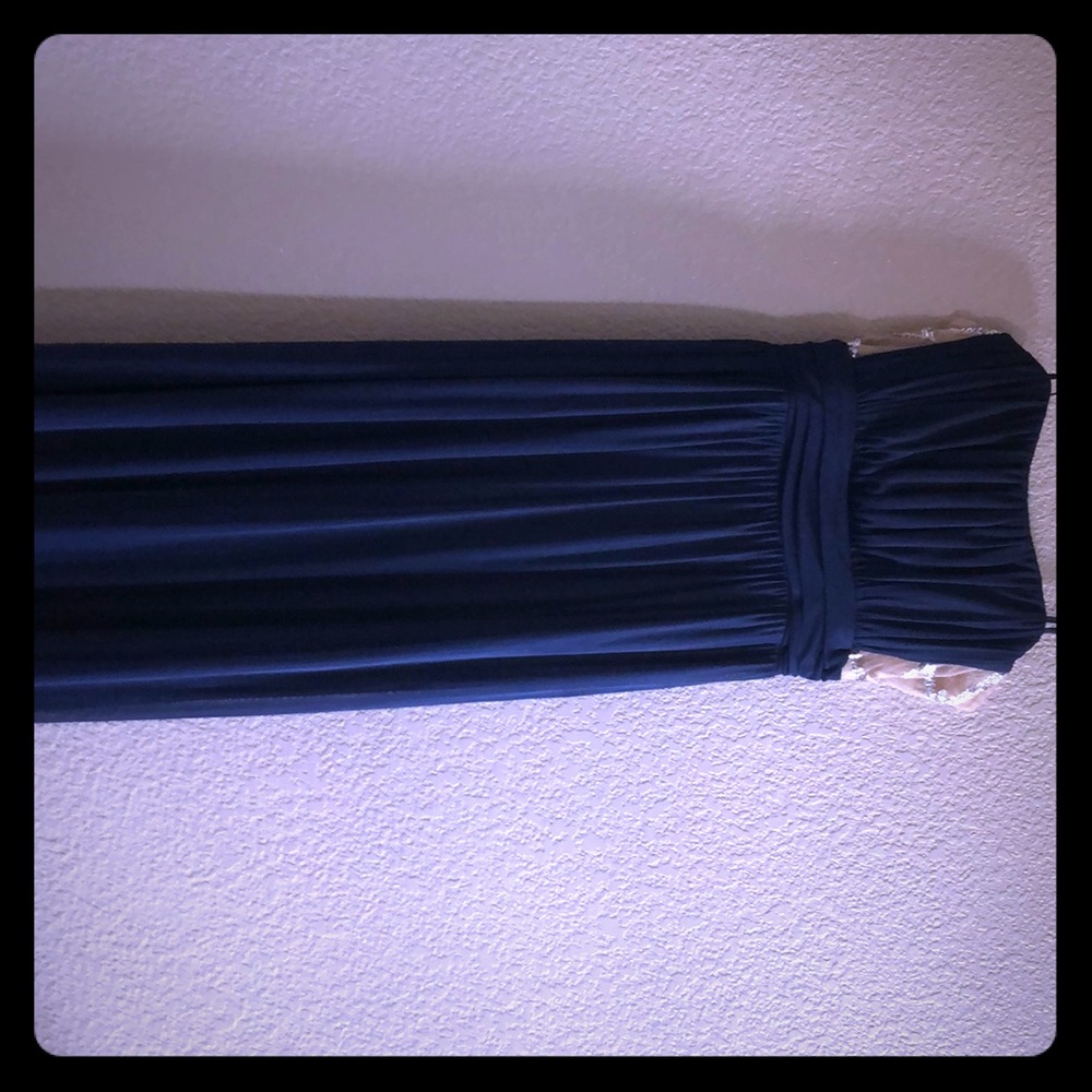 Blue strapless gown by Jodi kristopher